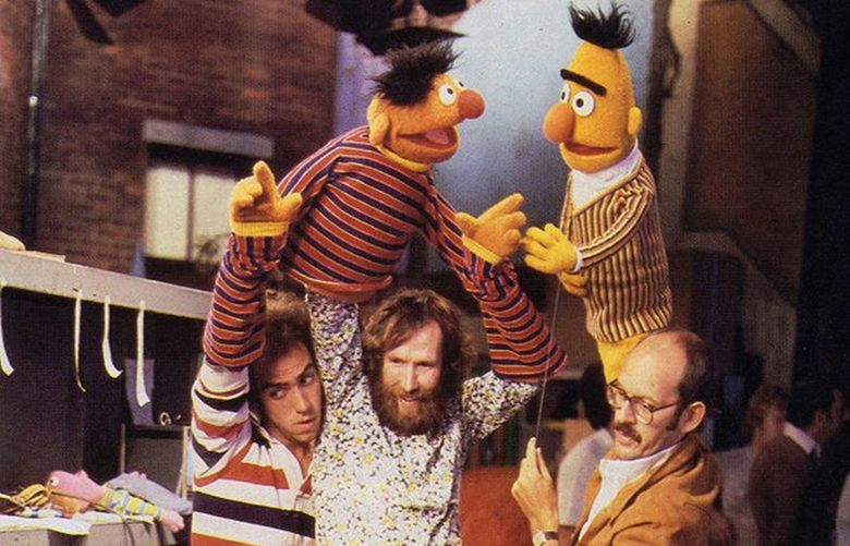 Richard Hunt (left), Jim Henson (center), and Frank Oz (right) performing Ernie and Bert, on the set of Sesame Street, 1970s. © Sesame Workshop