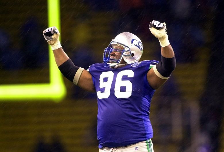 Cortez Kennedy celebrates a victory over the Raiders during the 2000 season, the final year of his career. (AP Photo/Cheryl Hatch)