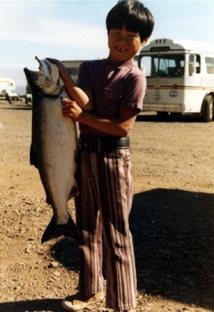 Seattle Times outdoors reporter with a nice coho he caught off Pillar Point at Sekiu when he was eight years old. (Photo by George Yuasa)