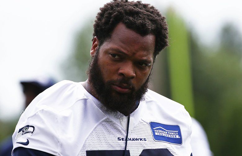 Former Seahawk Michael Bennett reflective rather than bitter in return to  Seattle on book tour