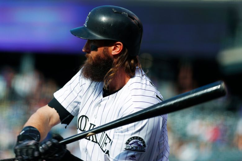 Complete with bushy beard and mullet, Blackmon leads Rockies