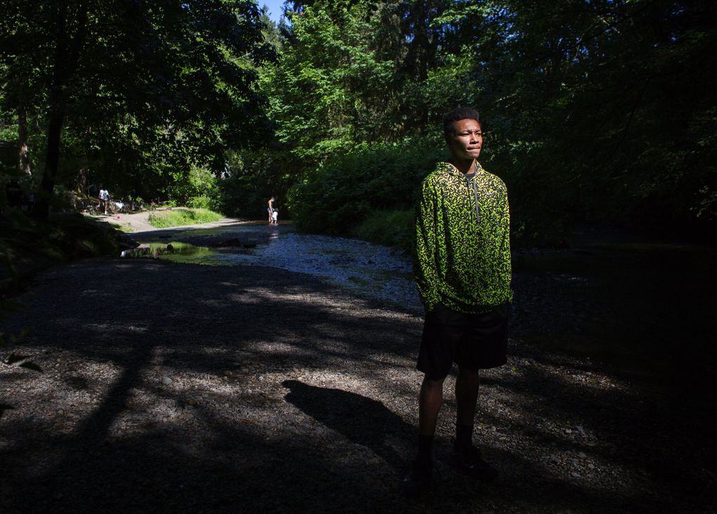 Semaj Booker at Kobayashi Park in University Place on Monday, June 6, 2016. Booker says he often comes to the park with friends. “I like the sound of the water,” he says. (Lindsey Wasson / The Seattle Times)