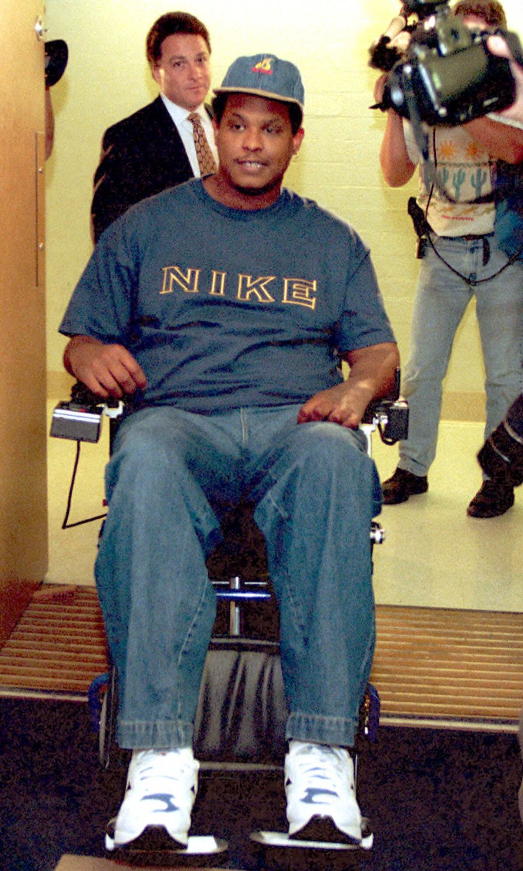 Mike Frier maneuvers his wheelchair before a news conference at the UW Medical Center in Seattle. The former Seahawks defensive lineman spoke for the first time since a Dec.1,1994 accident left him paralyzed. (GARY STEWART/Associated Press)