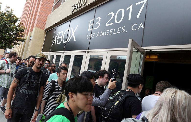 IMAGE DISTRIBUTED FOR MICROSOFT – Gamers enter the Xbox E3 2017 Briefing on Sunday, June 11, 2017 in Los Angeles. (Photo by Casey Rodgers/Invision for Microsoft/AP Images)