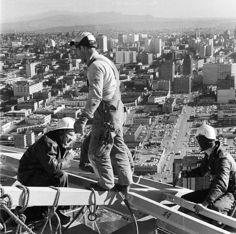 Courtesy of The Seattle Public Library, [spl_gg_72320007]

Title: Construction workers on top of Space Needle, ca. November 1961
Identifier: spl_gg_72320007
Subjects (LCSH): Century 21 Exposition (1962 : Seattle, Wash.)
Space Needle (Seattle, Wash.)
Construction workers
Seattle (Wash.)–Aerial views
Buildings–Washington (State)–Seattle
Photographer: Gulacsik, George, 1923-2010
Neighborhood: Queen Anne
Downtown
Belltown
Central Business District
Date: 1961-11
Decade: 1960-1969
Notes: Because no images in this collection were dated, dates provided are approximations based on the construction notebook kept by George Gulacsik (a digital version of which is available through this collection), Seattle Times articles and other resources.
Collection: George Gulacsik Space Needle Photograph Collection
Box: 1
Folder: 12F
Film Format: black and white negative
Physical Measurements: 35mm
Type: image
Local Type: photographs
Digitization Specifications: Master image scanned with Noritsu Koki at 72 pixels per inch, 24 bit color, and saved as a JPG file. Master image file size: 3,574,500 bytes.
Rights and Reproduction: For information about rights and reproduction, visit http://cdm16118.contentdm.oclc.org/cdm/rights