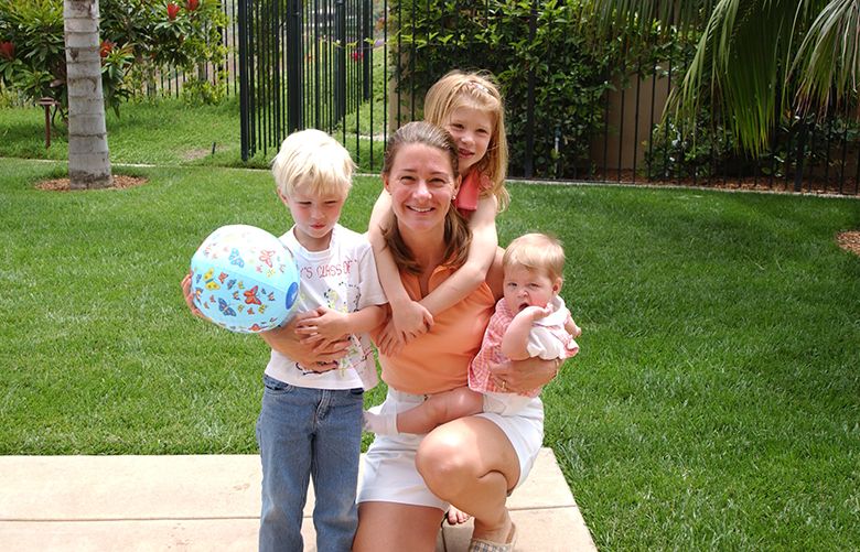 Melinda Gates, co-chair of the Bill & Melinda Gates Foundation, a businesswoman and mother, with her three children (from left) Rory, Jennifer and Phoebe. Photo is 2003.Credit: Gates Archive
