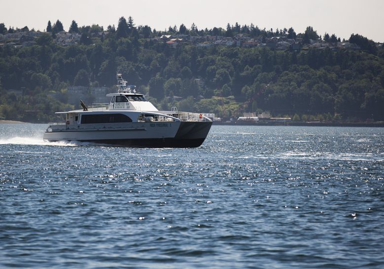 A ride from Bremerton to downtown Seattle on Kitsap Transit’s new fast ferry is a shorter commute trip than the bus from north Ballard to downtown Seattle. (Kjell Redal/The Seattle Times)