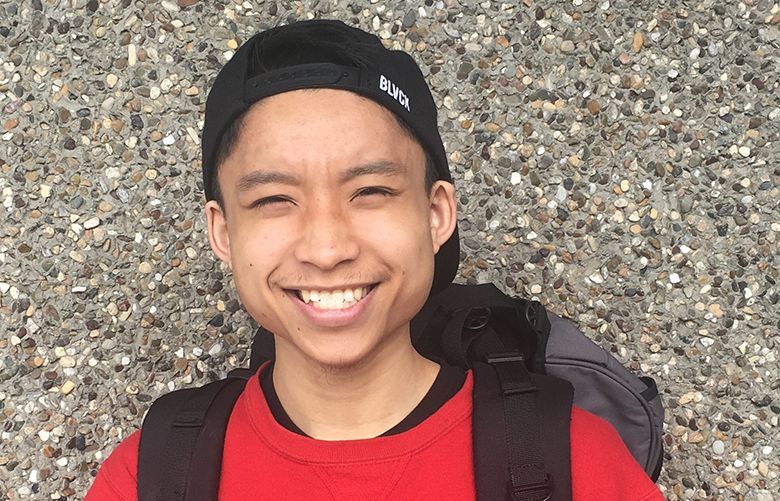 This photo of Tommy Le was shown during the Career Link’s alternative high school diploma graduation ceremony June 14. Classmates at the time were unaware he had been killed by a King County Sheriff’s Office deputy. (Curt Peterson / Career Link)