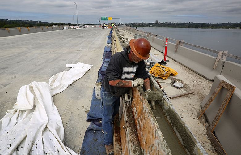 New Montlake exit from 520 bridge prepared to open Monday morning The Seattle Times