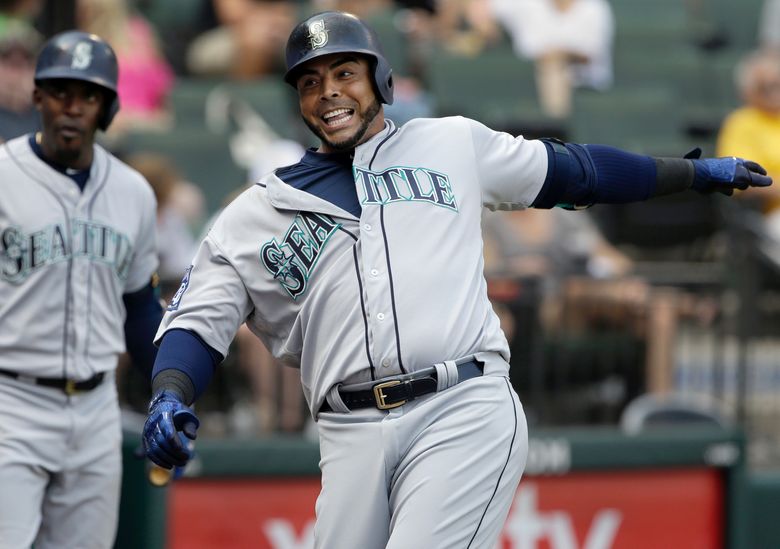 Angels play small ball, rally in 10th to beat Mariners