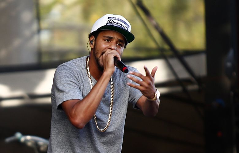 BUMBERSHOOT MON —  141315 — 09/01/2014Hip-hop artist J. Cole gestures to the crowd as he performs on the Mainstage during the final day of Bumbershoot on Monday, Sept. 1, 2014. The weekend festival concluded with Mainstage performances by bands like Capital Cities and Foster the People, as well as Seattle bands like La Luz and Campfire Ok.