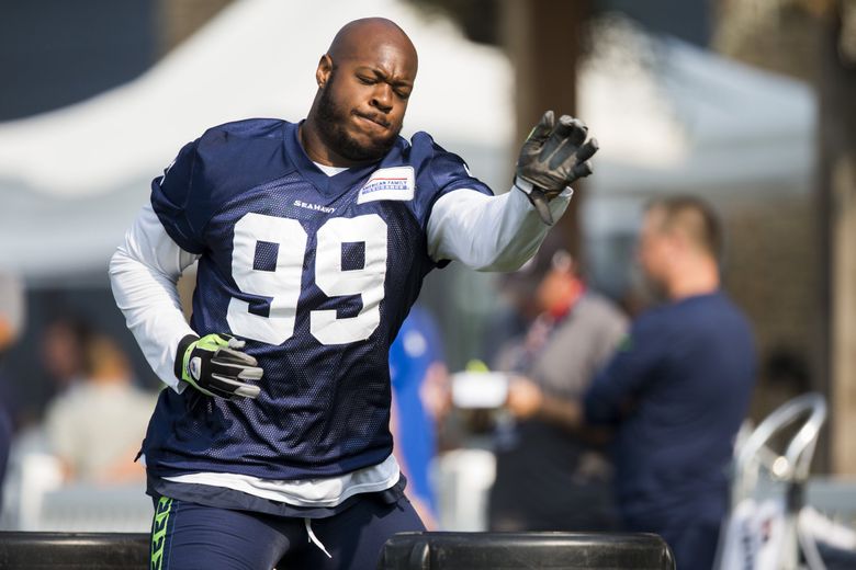 Seattle Seahawks defensive end Quinton Jefferson (99) reacts after