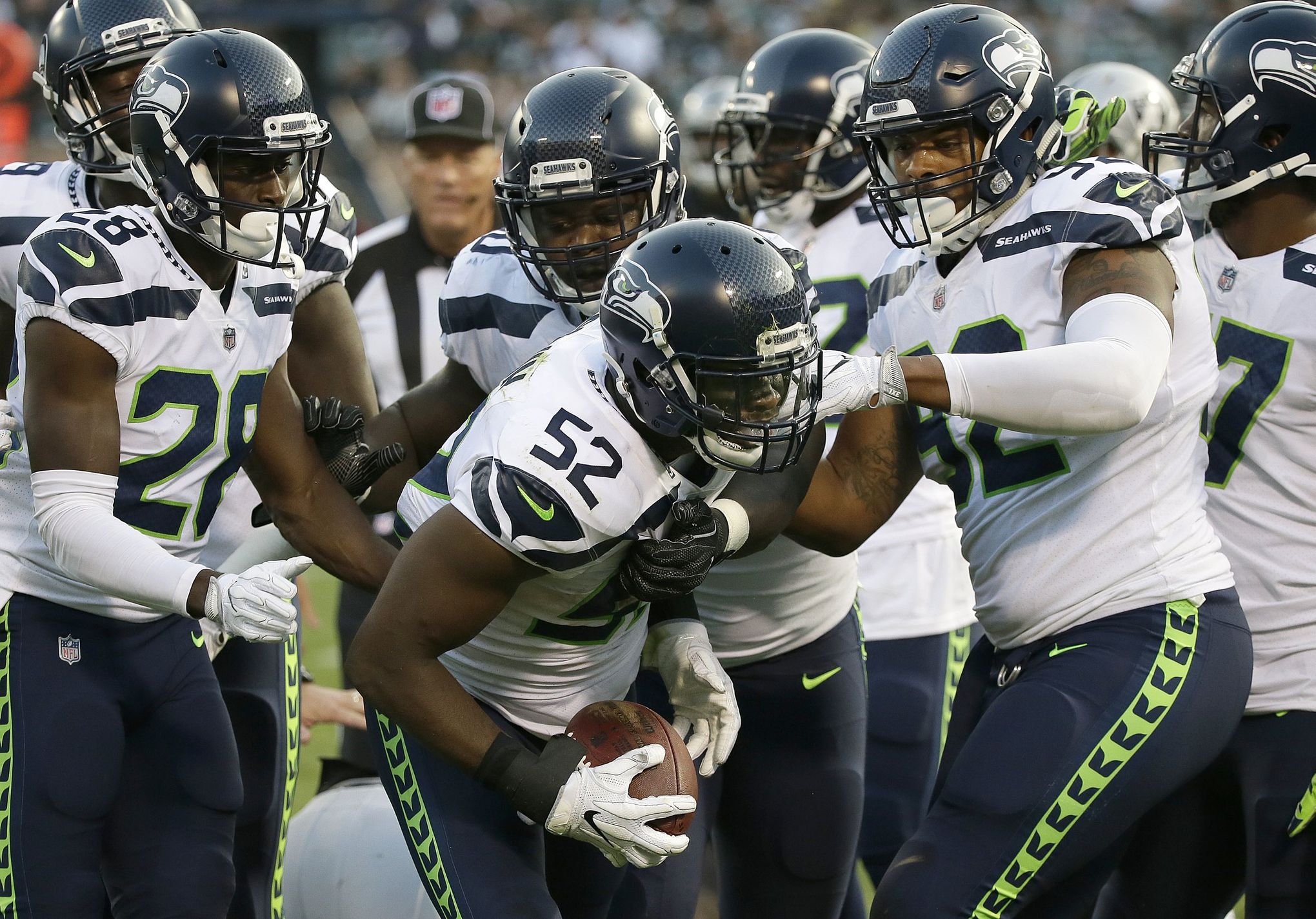 Seattle Seahawks including Thomas Rawls (34) and Cassius Marsh