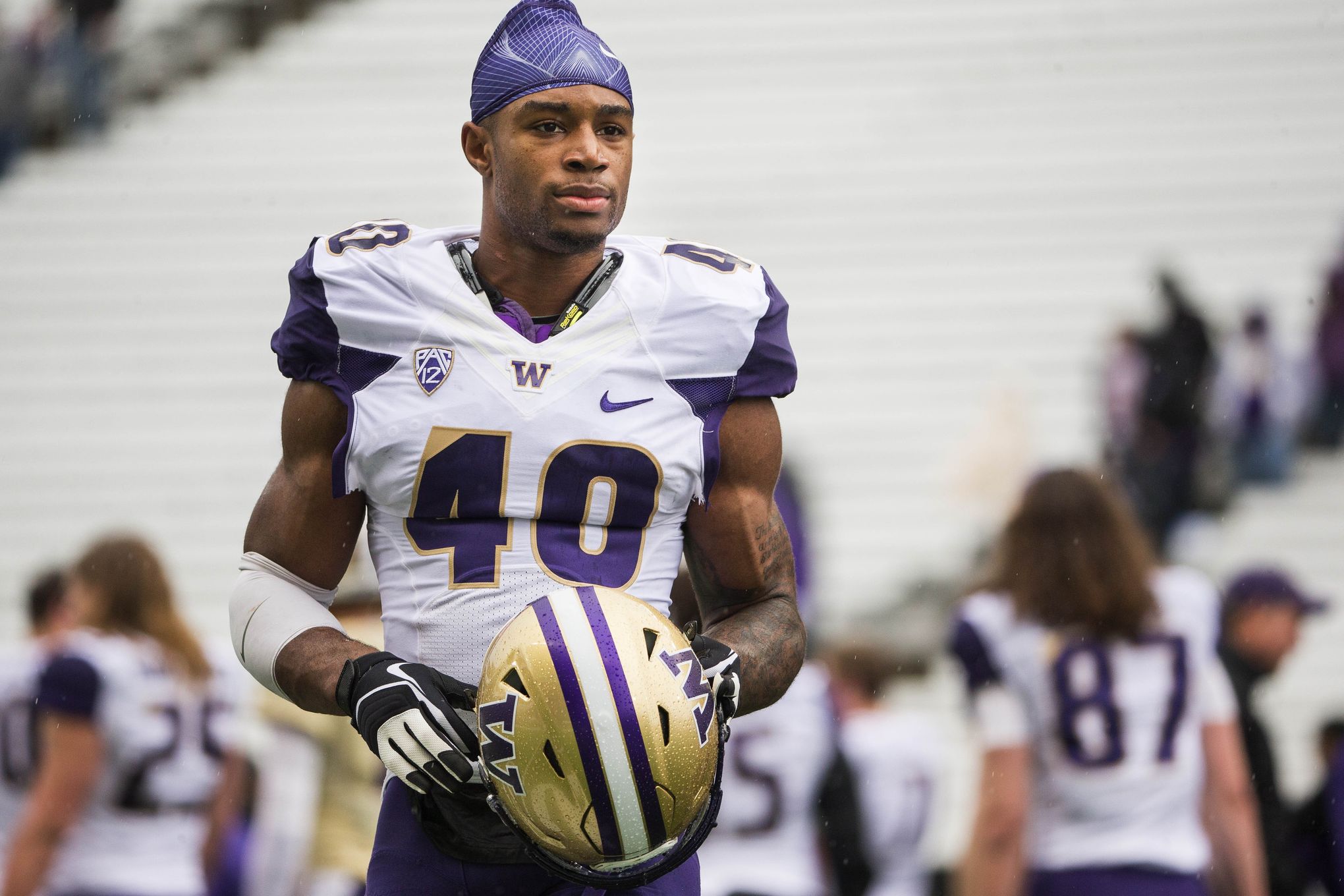 The Handoff: From Milloy To Baker - University of Washington Athletics