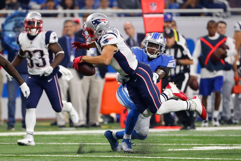 October 20, 2013: New England Patriots wide receiver Julian Edelman (11)  looks on with his helmet off during warm-ups prior to the NFL game between  the New England Patriots and the New