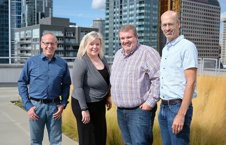 Executives at Seattle marketing software startup Amplero, from left, chief technology officer Andrew Toner, chief business officer Lisa Clarke, chief executive officer Olly Downs, and senior vice president Mike Zell. (Credit Chris Beckman)