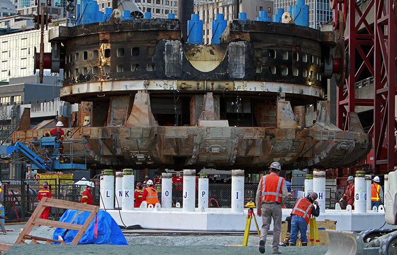 All 2000 tons of Bertha’s cutter head assembly is above ground, Mon., March. 30, 2015, in Seattle.