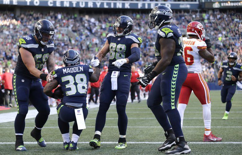 Seattle Seahawks fullback Tre Madden (38) runs for a 66-yard gain after  catching a short pass in the third quarter against the Houston Texans at  CenturyLink Field in Seattle, Washington on October