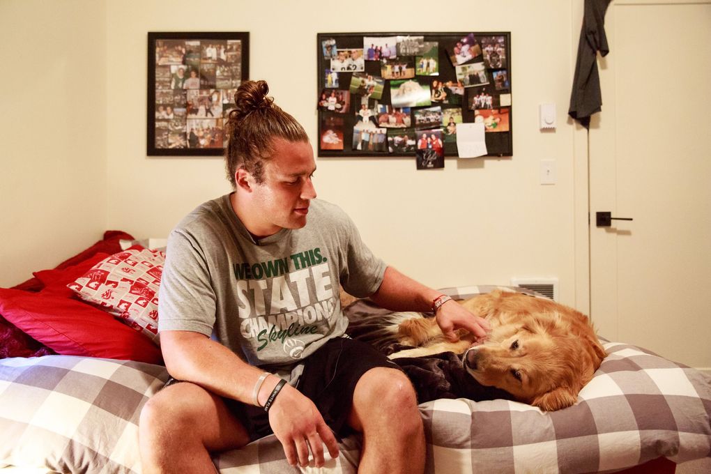 Linebacker Peyton Pelluer shows of his room, and his dog Lily, at his apartment in Pullman, Wash. Wednesday July 5, 2017. Pelluer lives with several seniors and a junior on the WSU football team. (Erika Schultz / The Seattle Times)