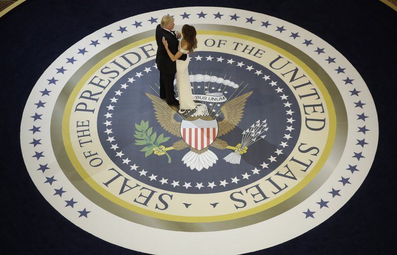 FILE – In this Jan. 20, 2017, file photo, President Donald Trump dances with first lady Melania Trump, at The Salute To Our Armed Services Inaugural Ball in Washington. When President Donald Trumpâ€™s inaugural committee raised an unprecedented $107 million for a ceremony that officials promised would be â€œworkmanlike,â€ the committee pledged to give leftover funds to charity. Nearly eight months later, the group has helped pay for redecorating at the White House and the vice presidentâ€™s residence in Washington. But nothing has gone to charity. (AP Photo/Evan Vucci, File) WX107 WX107