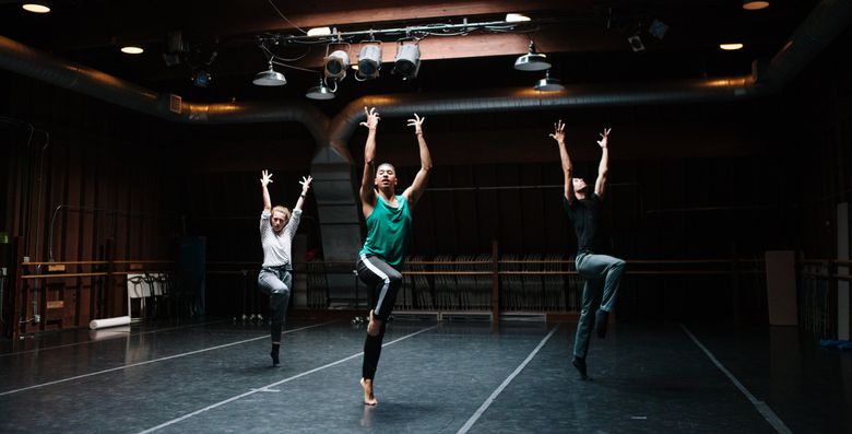 Spectrum Dance Theater company members Mary Sigward, left, Alex Crozier, center, and Andrew Pontius rehearse. (Ramon Dompor / Special to the The Seattle Times)