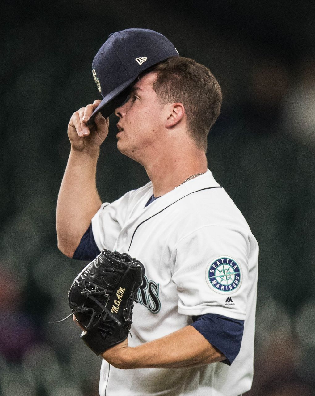 Mariners reliever Emilio Pagan collects himself after giving up a solo home run to Texas’ Shin-Soo Choo in the 7th inning. (Dean Rutz / The Seattle Times)