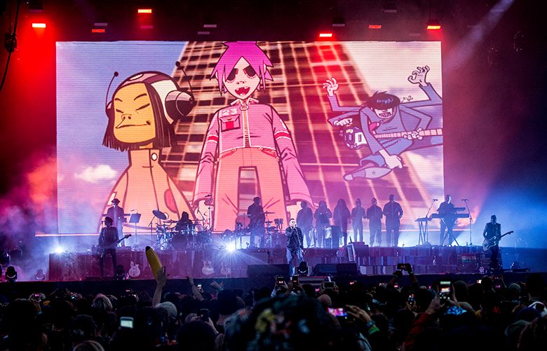 Damon Albarn, center, of Gorillaz performs at the 2017 Outside Lands Music Festival at Golden Gate Park on Friday, Aug. 11, 2017, in San Francisco, Calif.(Photo by Amy Harris/Invision/AP)