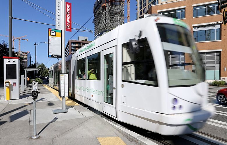 On Thursday, September 14, 2017, the South Lake Union streetcar heads South along Westlake Ave North near Amazon headquarters.