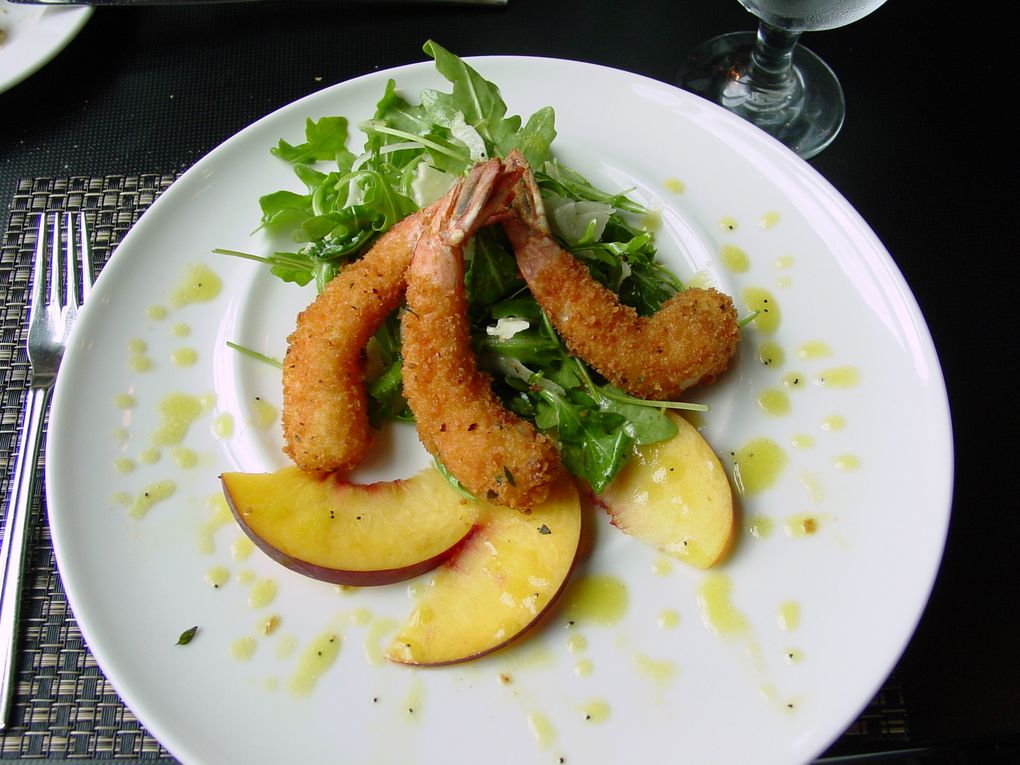 An appetizer at Bistro 101 featured prawns arrayed on a bed of arugula and fennel, garnished with fresh peach slices. A three-course gourmet lunch costs less than $20 U.S. at the restaurant run by a culinary arts academy. (Cathy McDonald)