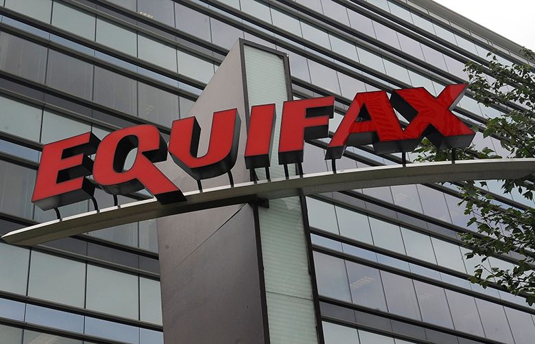 FILE – This July 21, 2012, file photo shows Equifax Inc., offices in Atlanta. On Monday, Sept. 11, 2017, Equifax said it has made changes to address customer complaints since it disclosed a week earlier that it exposed vital data on about 143 million Americans. Equifax has come under fire from members of Congress, state attorneys general, and people who are getting conflicting answers about whether their information was stolen. Equifax is trying again to clarify language about people’s right to sue, and said Monday it has made changes to address customer complaints. (AP Photo/Mike Stewart, File)