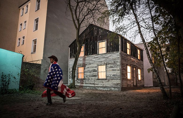 FILE — Ryan Mendoza, an American artist, in front of a house where Rosa Parks once lived in Detroit, which he transported to Berlin and rebuilt, April 26, 2017. The house that was a haven to the civil rights pioneer in the 1950s was turned into an art exhibit, but it still needs a permanent home. (Gordon Welters/The New York Times)