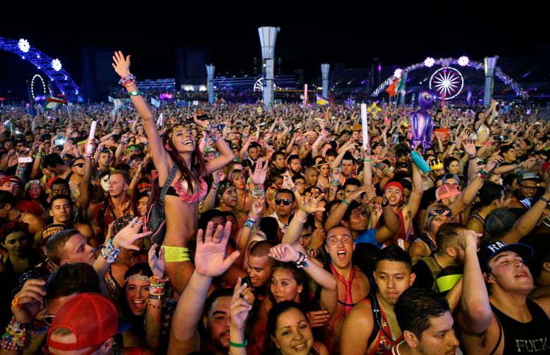 Attendees relax by the Tokyo Karaoke Bar during the second day of the  Electric Daisy Carnival a …