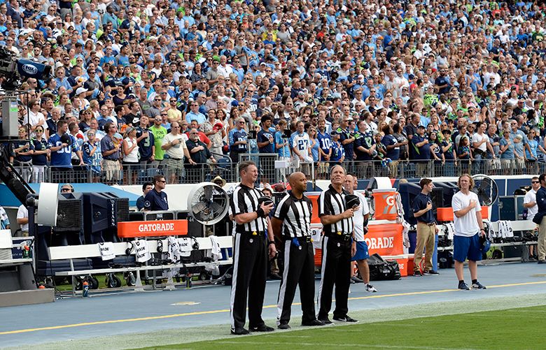 All Seahawks Stand for NFL's Coordinated National Anthem on the 20th  Anniversary of 9/11