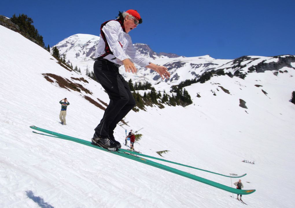 Gordy Skoog, Lowell’s brother, jumps off a ski ramp at Mount Rainier. Gordy flapped his arms, windmilling like their father had decades earlier when he jumped, according to Lowell. (Mike Siegel/The Seattle Times)