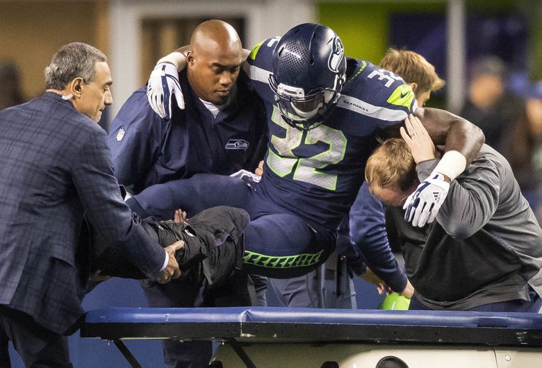 September 12, 2021: Seattle Seahawks running back Chris Carson (32) runs  with the ball during NFL football game action between the Seattle Seahawks  and the Indianapolis Colts at Lucas Oil Stadium in