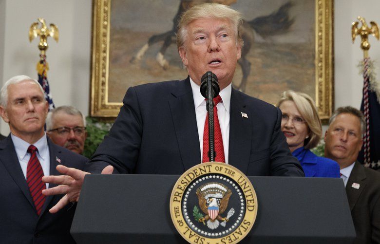 President Donald Trump speaks before signing an executive order on health care in the Roosevelt Room of the White House, Thursday, Oct. 12, 2017, in Washington. (AP Photo/Evan Vucci) DCEV123 DCEV123