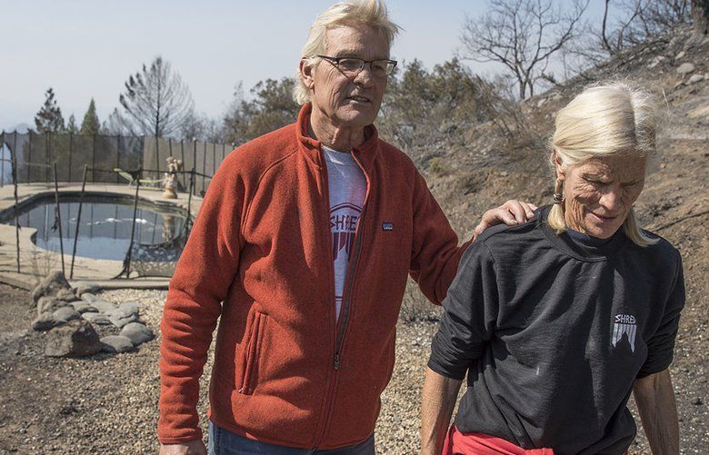 John and Jan Pascoe survived the firestorm Monday morning by running out of their home and into their neighbors’ swimming pool in Santa Rosa, Calif., on Thursday, Oct. 12, 2017. (Brian van der Brug/Los Angeles Times/TNS) 1213154 1213154