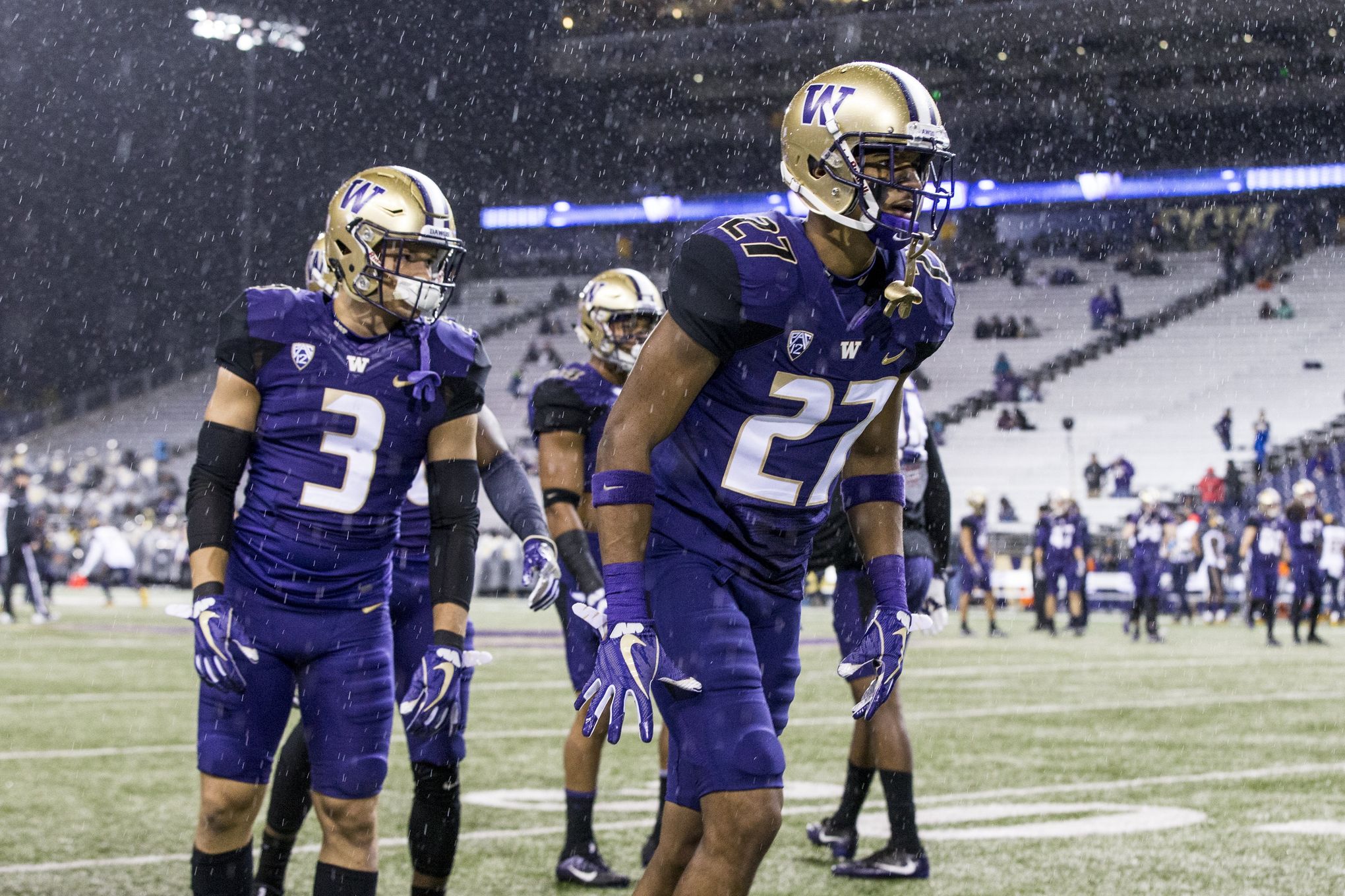 UW Huskies spring practice notes: Chrome helmets and interceptions