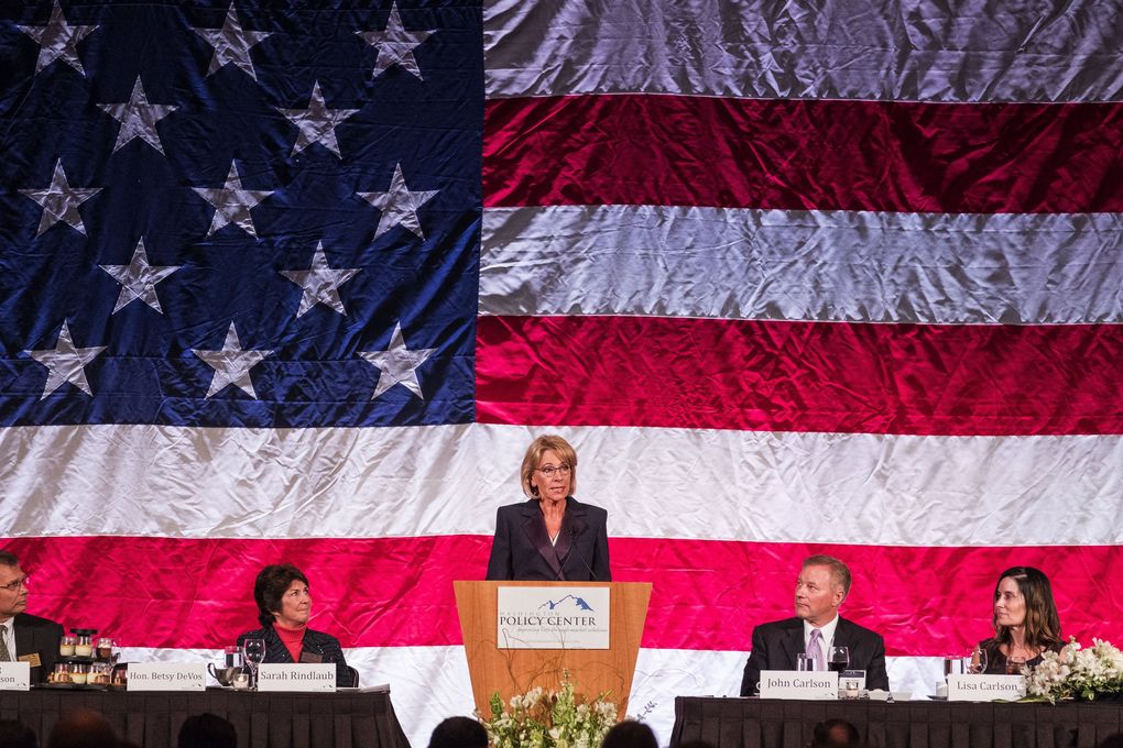 Education Secretary Betsy DeVos addresses the annual dinner of the Washington Policy Center Friday. (Dean Rutz / The Seattle Times)
