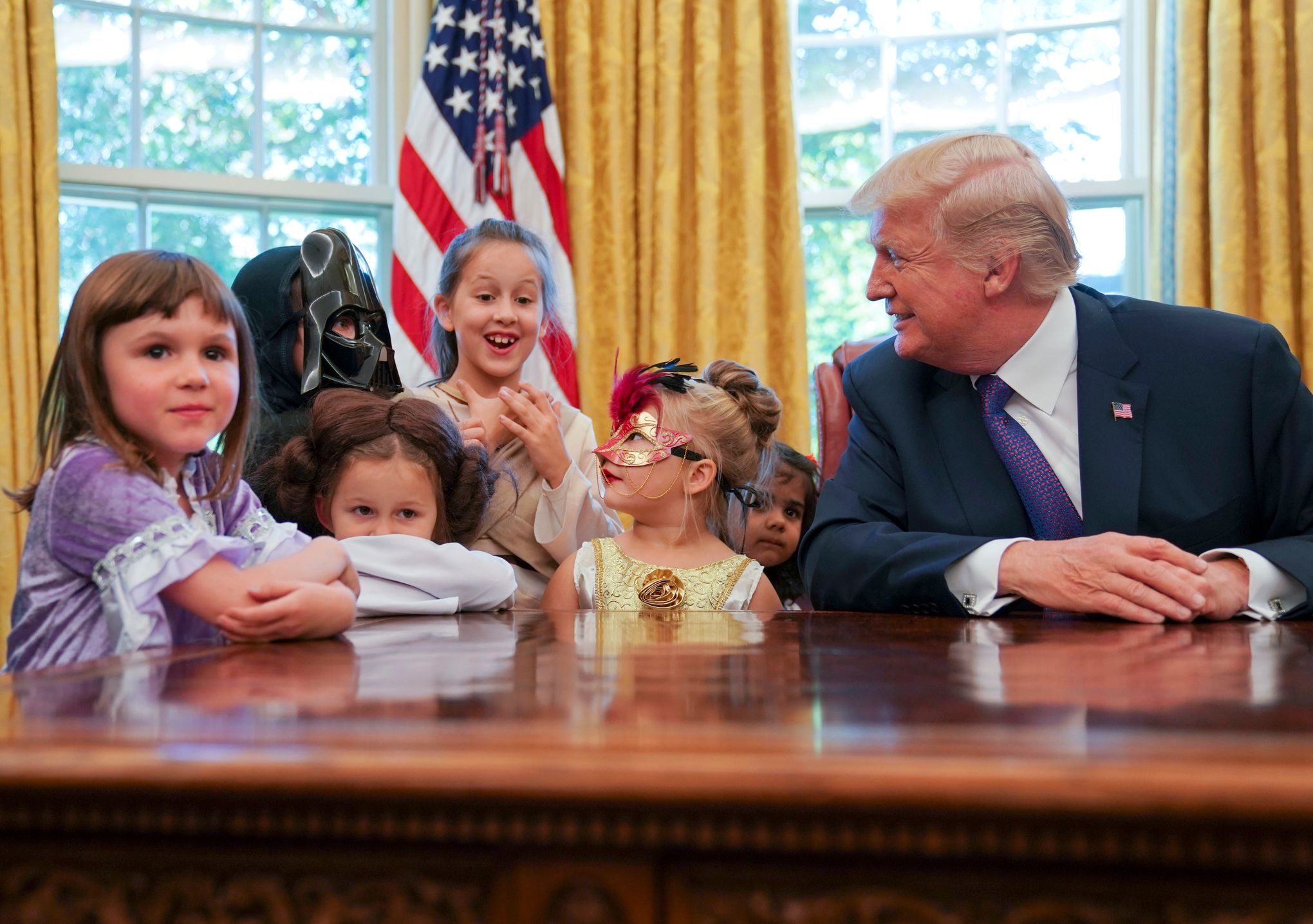 Trump greets kids in Oval Office for early Halloween treats | The Seattle Times