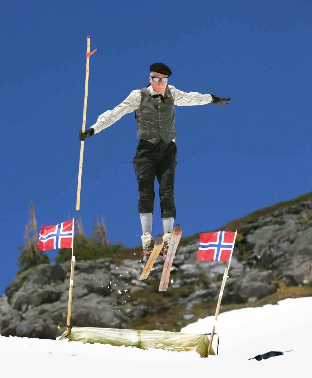 Lowell Skoog, a ski historian, recreated a ski-jumping event last summer at Mount Rainier National Park, the site of a similar event 100 years ago. Skoog, family and friends built the jump along the Alta Vista Trail just north of the Paradise parking lot, then took turns, jumping off it several times. (Mike Siegel/The Seattle Times)