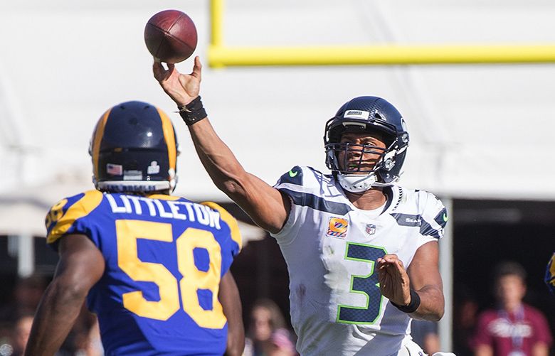 Seahawks vs. Rams score: Russell Wilson, defense shine in second half as  Seattle clinches NFC West 