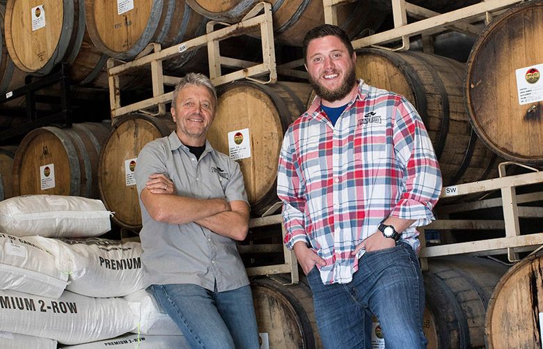 Bert and Christian Weber at Common Roots Brewing Company, their father-and-son business in South Glens Falls, N.Y., Oct. 5, 2017. Setting up a multigenerational enterprise can be a smart way for retired baby boomers and their grown children to combine resources and abilities. (Nathaniel Brooks/The New York Times)