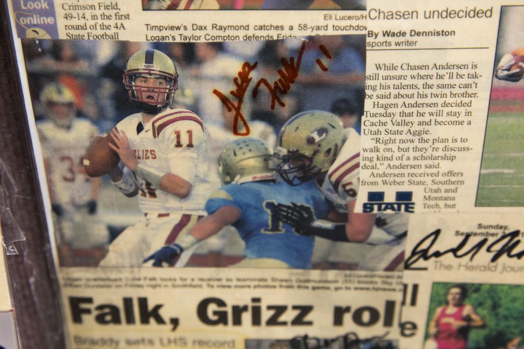 Luke Falk is the star in many of the old newspaper clippings in the classroom of Logan Brown, a teacher and basketball coach at Logan High School. Falk played basketball for Brown. (Bettina Hansen/The Seattle Times)