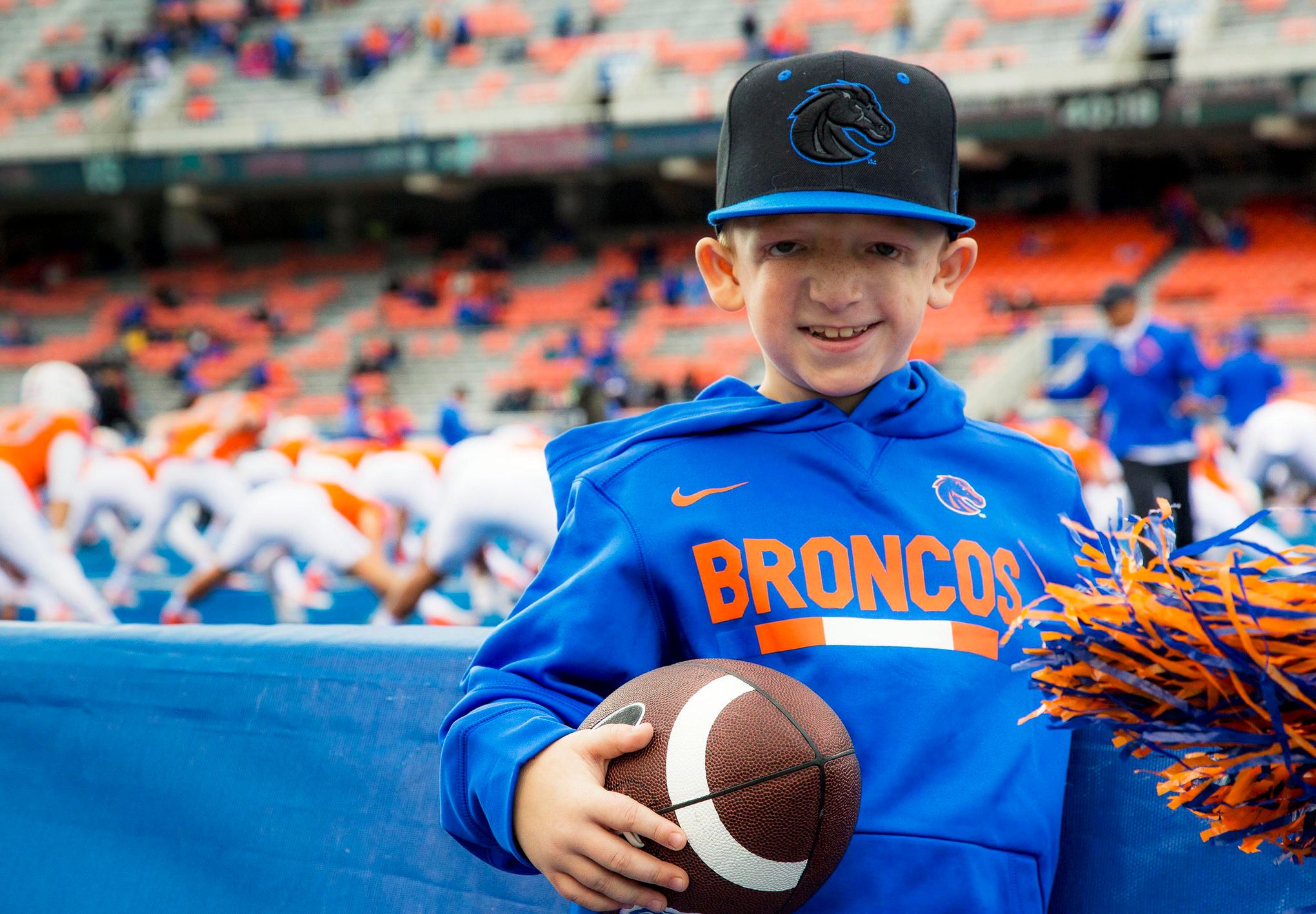 Cheerleader Girl And Quarterback Young Man Fans Of American