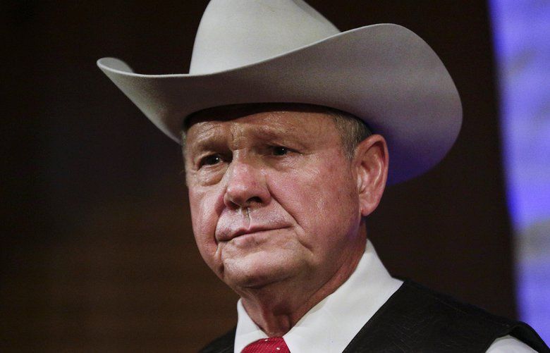 FILE – In this Monday, Sept. 25, 2017, file photo, former Alabama Chief Justice and U.S. Senate candidate Roy Moore speaks at a rally, in Fairhope, Ala. According to a Washington Post story Nov. 9, an Alabama woman said Moore made inappropriate advances and had sexual contact with her when she was 14. (AP Photo/Brynn Anderson, File) NY901 NY901