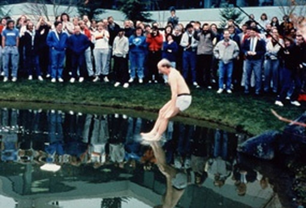 Steve Ballmer plunging into Lake Bill on the Microsoft campus in an undated photo. (Microsoft Archives)