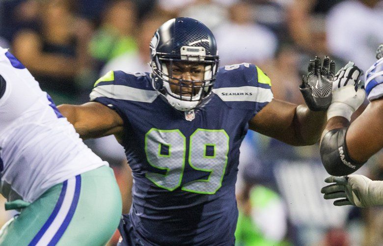 Photo: Seahawks defensive tackle Quinton Jefferson (99) celebrates after a  sack - PHI20191124115 