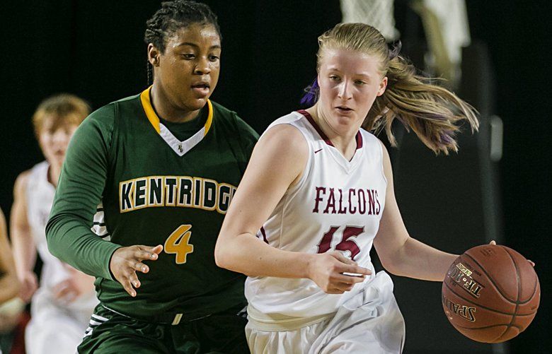 Kiernen Denckla, right, of Kentlake brings the ball upcourt against Morgan Gary, left, of Kentridge during the second half. Kentridge won 55-44.
Kentlake played Kentridge during the quarterfinals of the Hardwood Classic on Thursday, March 2, 2017 at the Tacoma Dome. 200934