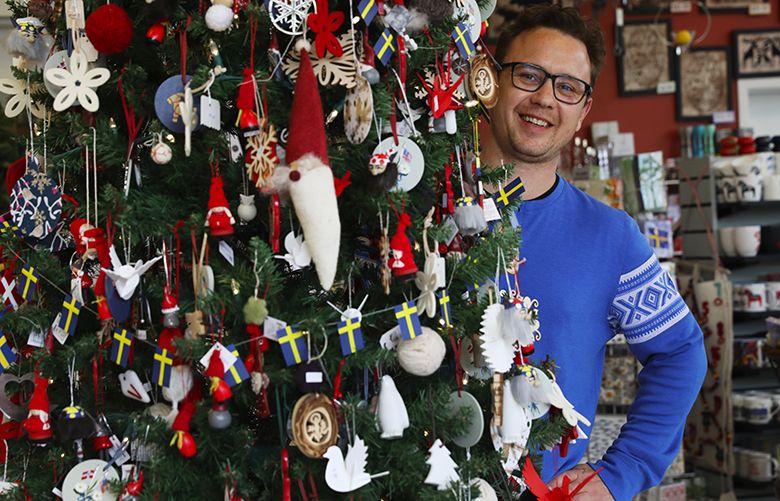 Bjorn Ruud’s business card lists him simply as “sjefen,” which is Norwegian for “boss,” at Scandinavian Specialties, Wednesday, Nov. 22, 2017, in Seattle’s Ballard neighborhood.